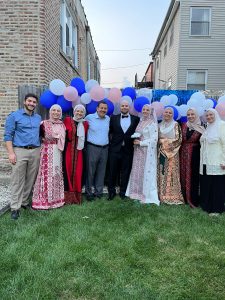 A photo of Rima Hammo with friends and family